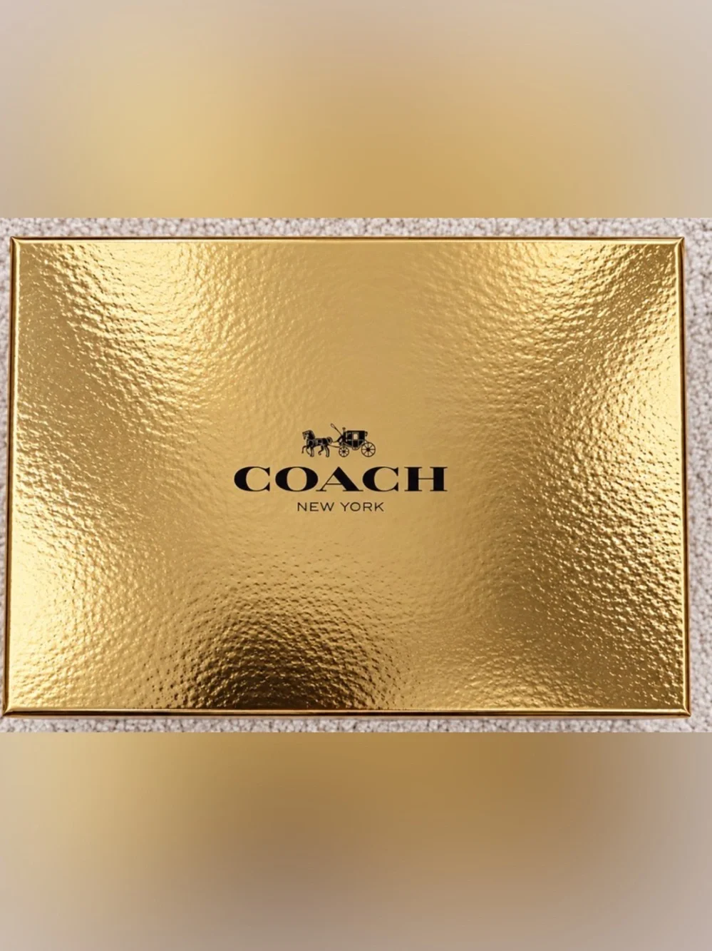 Coach Black Pebbled Leather Wristlet with Gold Logo